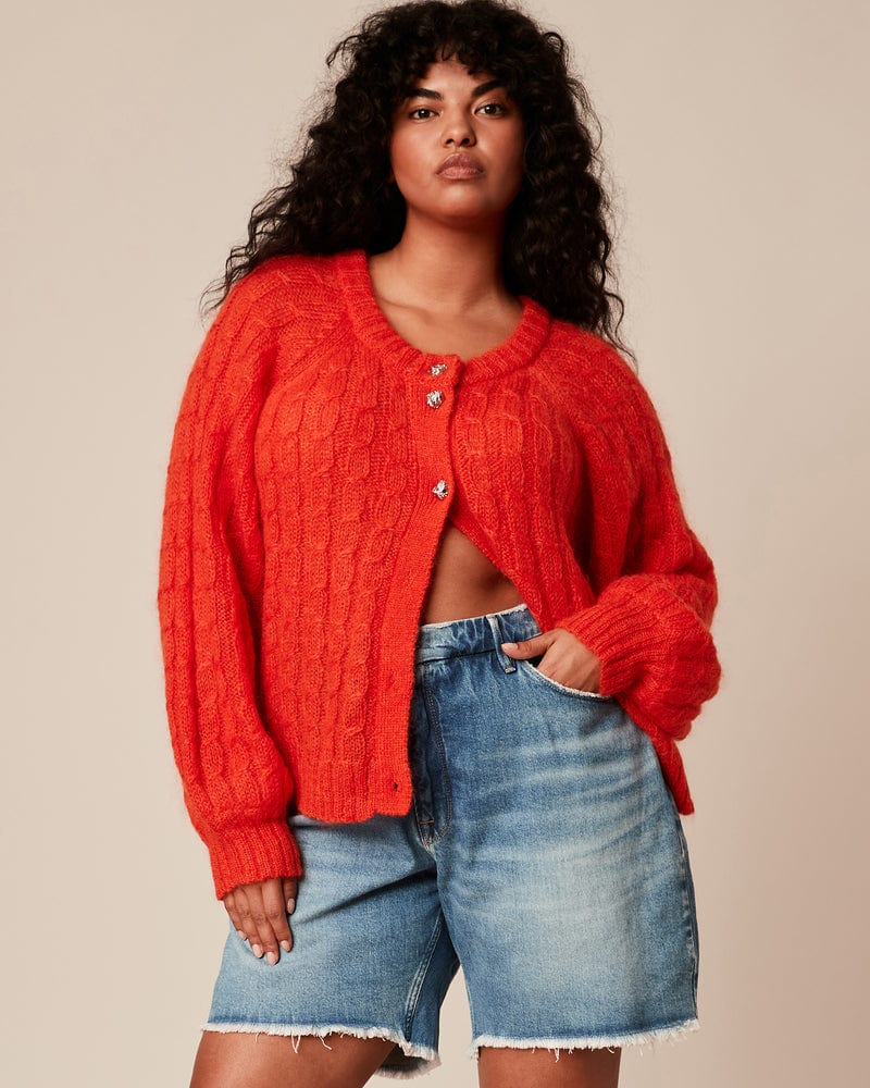 Front of a model wearing a size 3XL Mohair Cable Cardigan in Orange by GANNI. | dia_product_style_image_id:230131